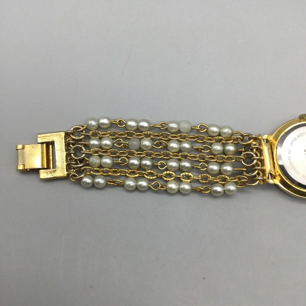 Futura Womens Watch 25mm MOP Dial Gold Tone Faux Pearl 3216 New Battery 6.75